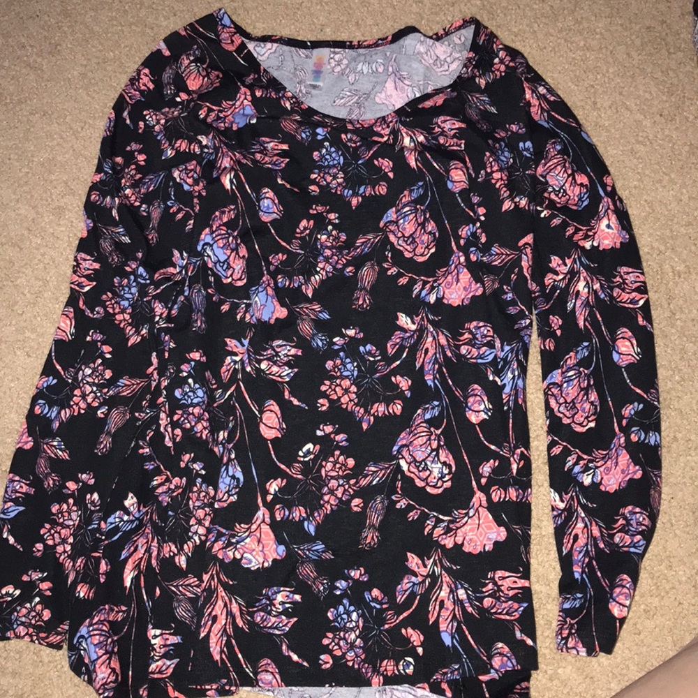 A woman’s floral printed long sleeve!